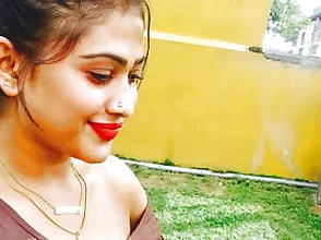 A horny Indian woman kisses a stranger in a hotel room.