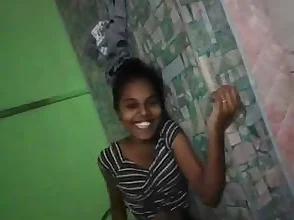 A Tamil woman engages in a sexual experience with a big penis while speaking in Tamil.