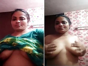 Big-boobed Indian wife showing off her charms